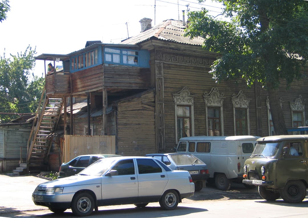 A wooden house with a balcony in Samara